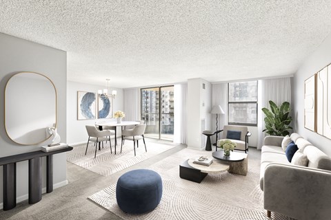 A modern living room with a dining table and chairs.