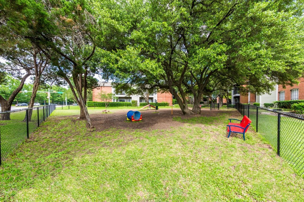 our apartments showcase a dog park with plenty of room to run and play