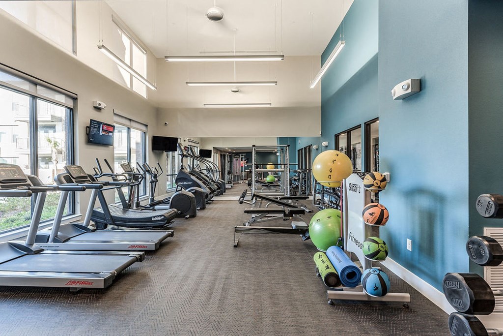 gym at soneto on western apartments