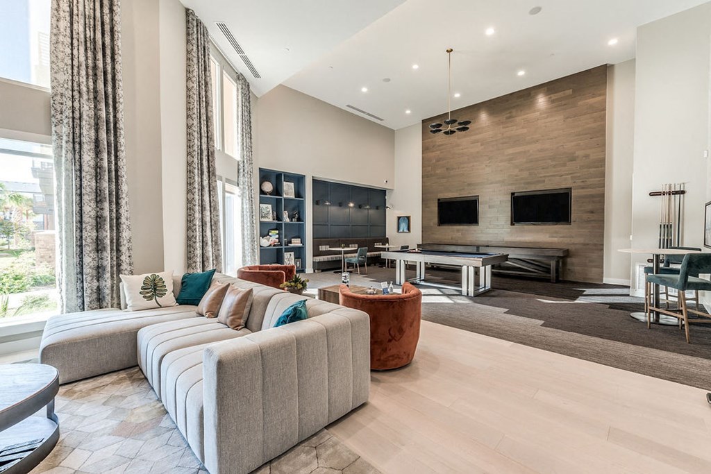 a living room with a couch and a table