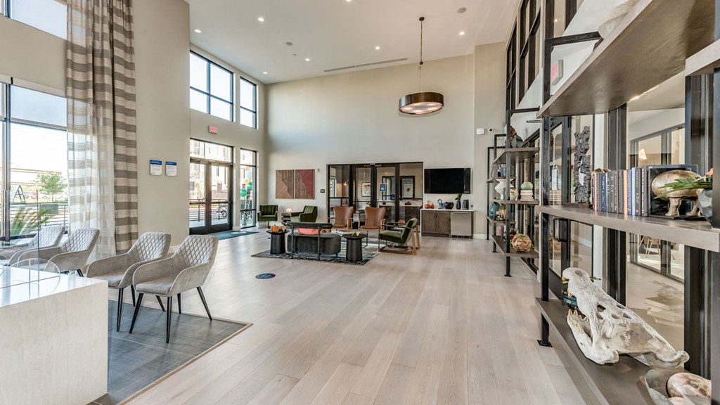 the living room is open to the dining room and kitchen