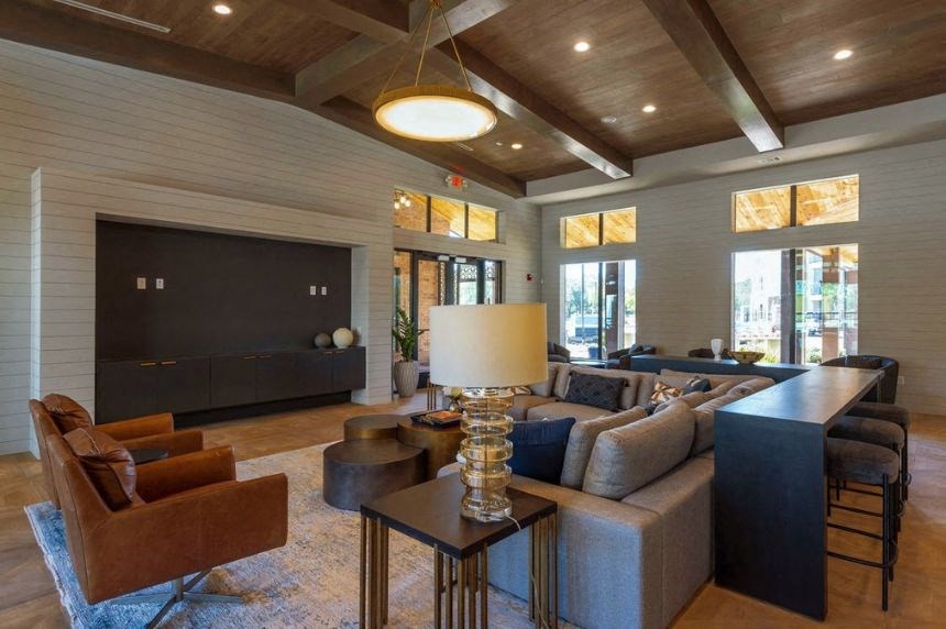 a living room with a couch and a television