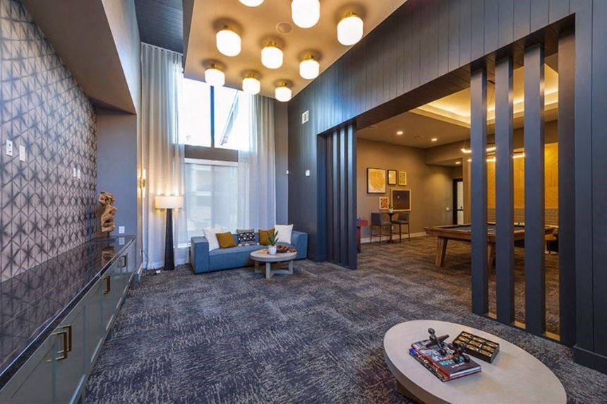 a living room with a couch and a table