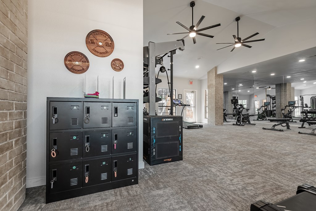 the gym in the clubhouse at trillium apartments