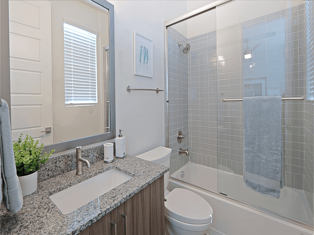 Walk-In Showers With Built-In Bench And Glass Enclosure at Scottsdale Hayden Townhomes, Scottsdale, Arizona