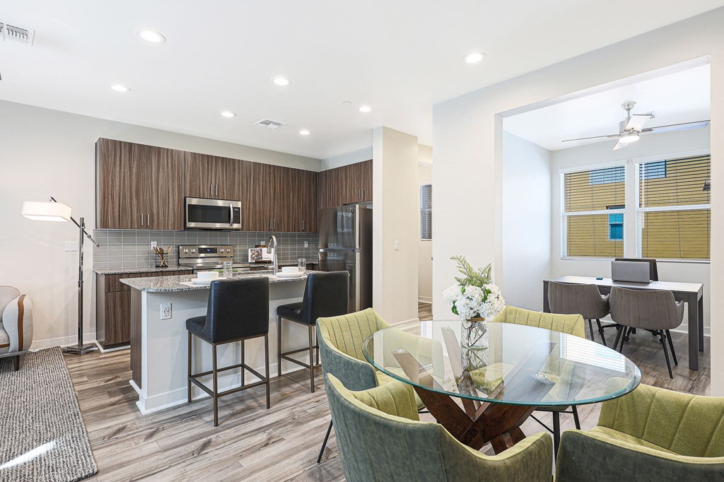 a kitchen and dining area in a 555 waverly unit at Scottsdale Hayden Townhomes, Arizona, 85257