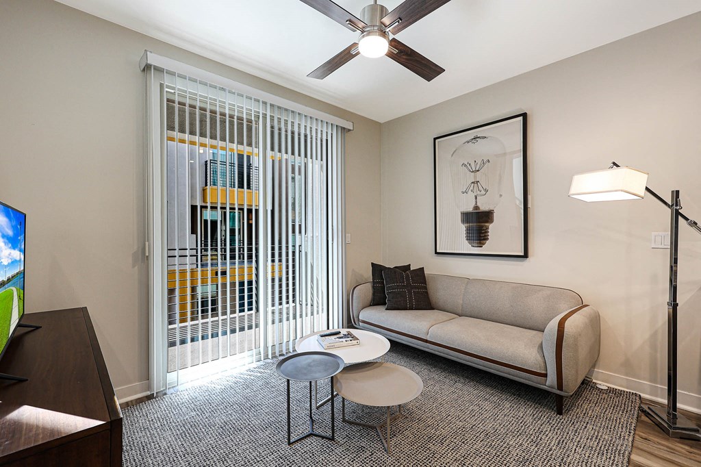 a living room with a couch and coffee table at Scottsdale Hayden Townhomes, Scottsdale