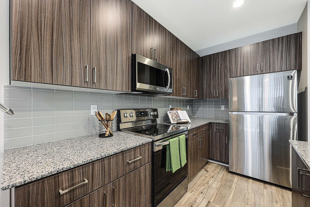 our apartments have a modern kitchen with stainless steel appliances at Scottsdale Hayden Townhomes, Scottsdale, AZ, 85257
