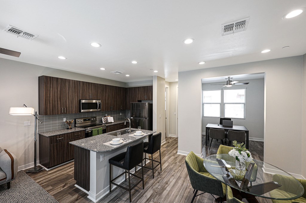a kitchen and dining area in a 555 waverly unit at Scottsdale Hayden Townhomes, Scottsdale, AZ