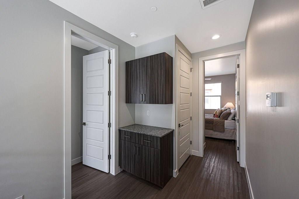 a bedroom with a bed and a desk in a room at Scottsdale Hayden Townhomes, Arizona, 85257