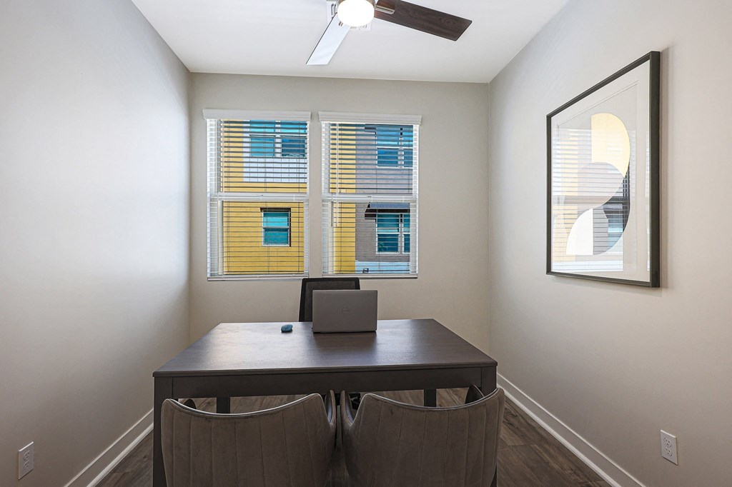 a home office with a large desk and two chairs at Scottsdale Hayden Townhomes, Arizona, 85257
