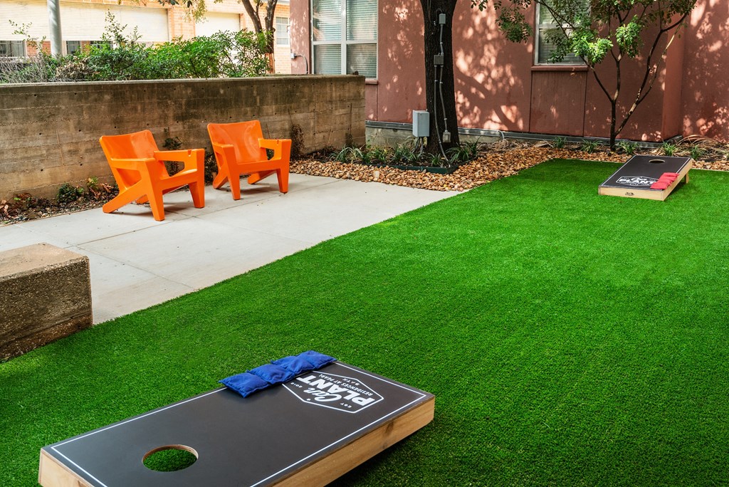 Outdoor game area at The Can Plant Residences at Pearl, San Antonio, TX 78215
