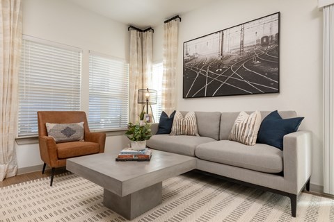 a living room with a couch and a coffee table