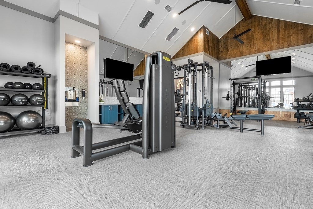 the gym at the flats at big tex apartments