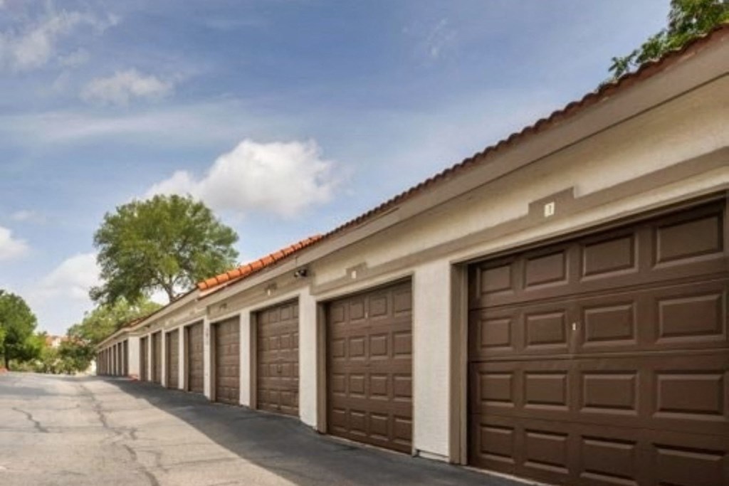a row of garages with brown doors  at Hayden on West Ave, San Antonio