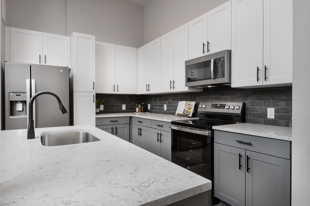 Bright And Spacious Kitchen With White Finishes