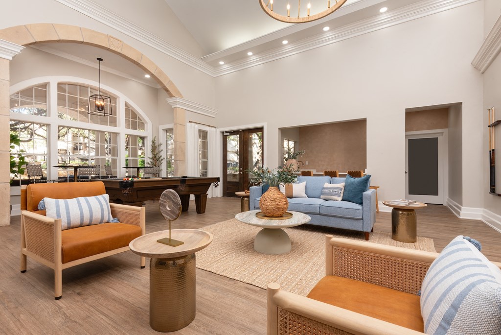a living room with couches and chairs and a pool table  at Hayden on West Ave, San Antonio, TX