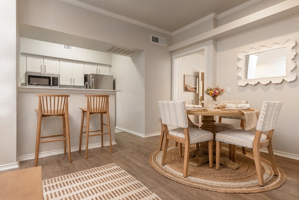 a dining room and kitchen with a table and chairs  at Hayden on West Ave, San Antonio, TX, 78216