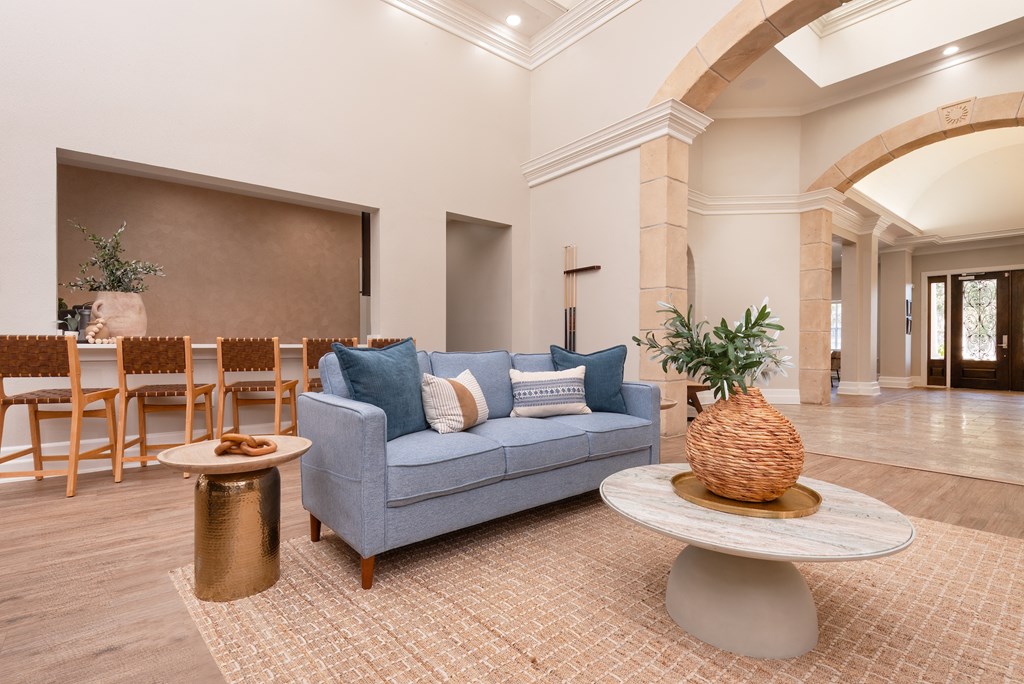 a living room with a couch and tables  at Hayden on West Ave, San Antonio, Texas