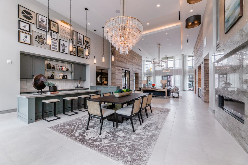 a dining room with a table and chairs and a fireplace