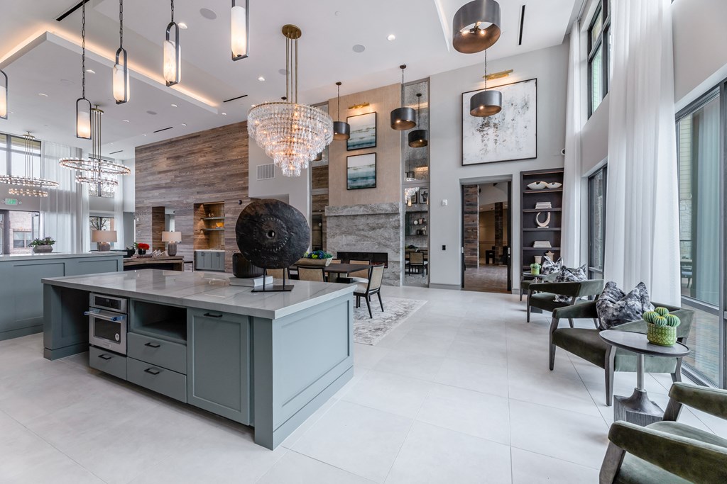 a kitchen with a large island in the middle of a room