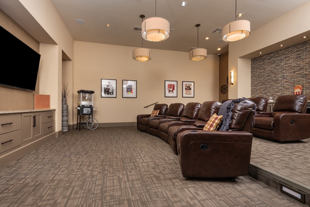 a large room with couches and a television