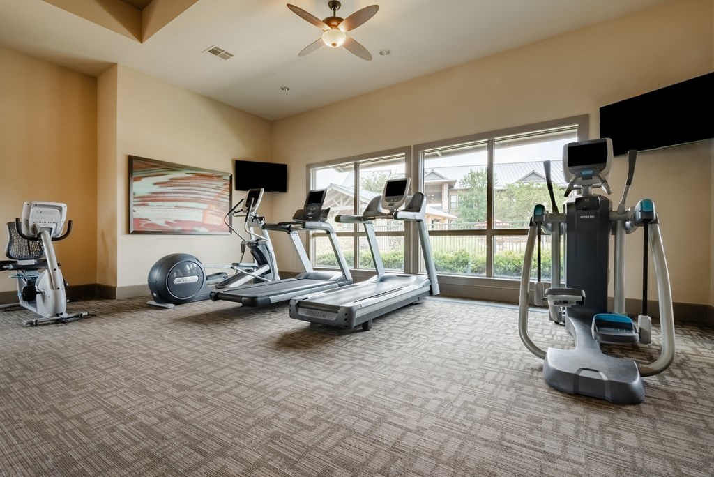 the gym at the shiloh green apartments in kennesaw, ga