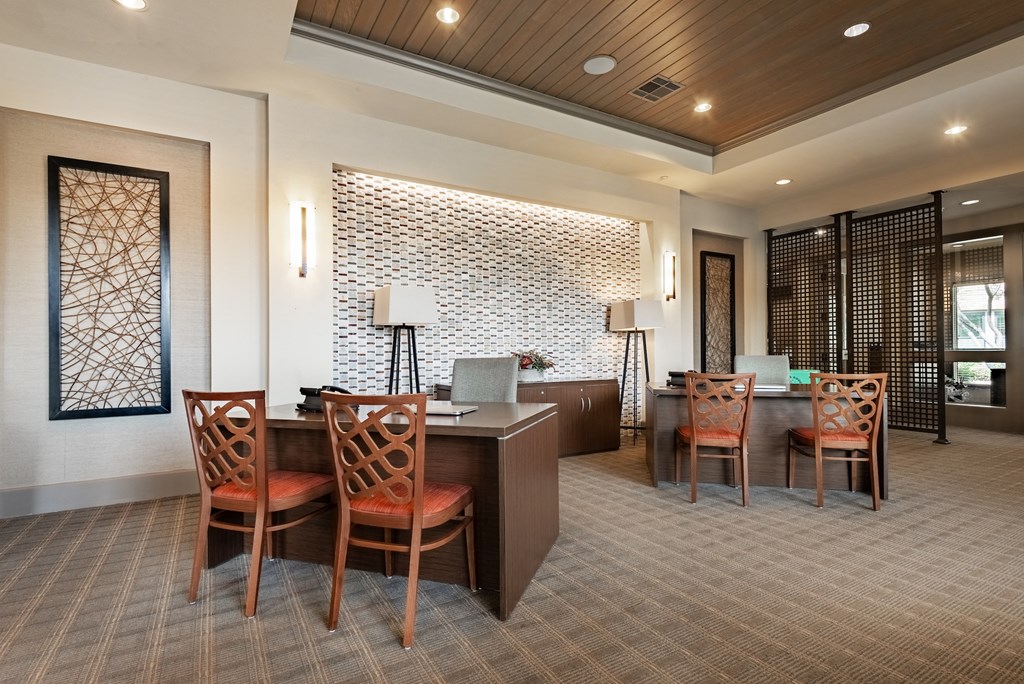 a room filled with furniture and a large window