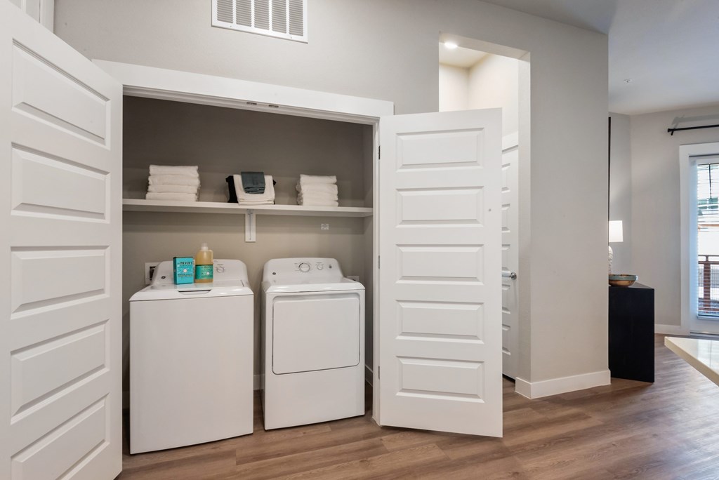 A laundry room with a washer and dryer.