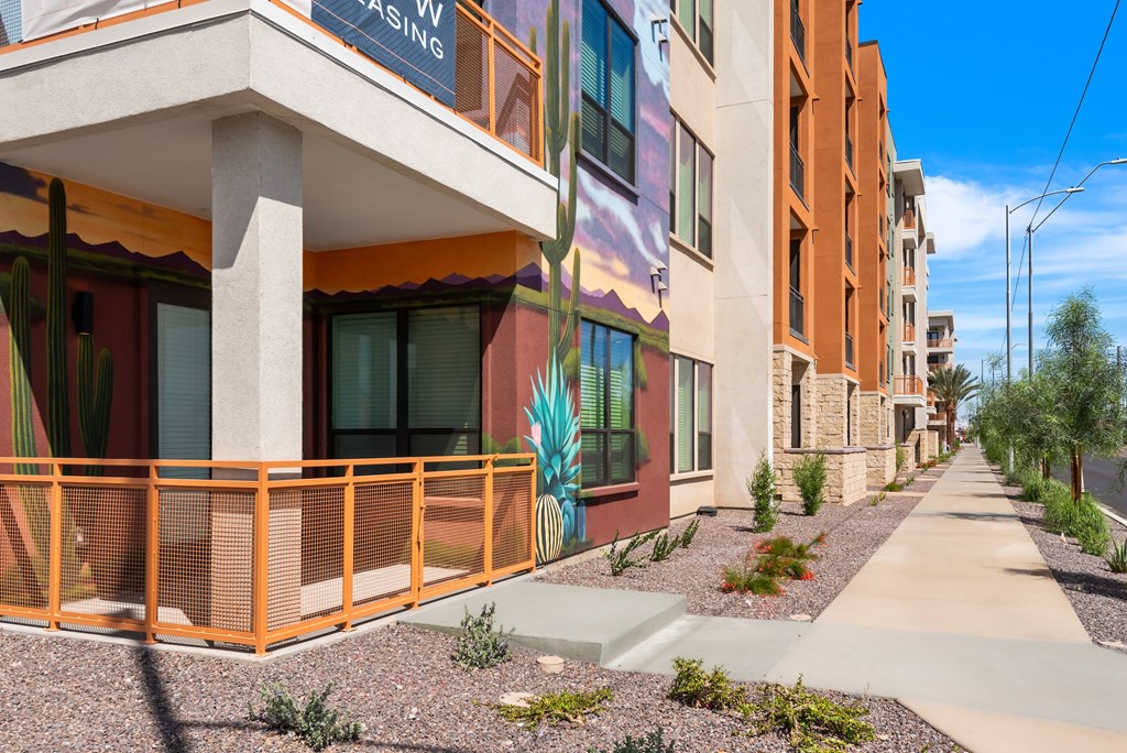 A street view of a building with a sign that reads