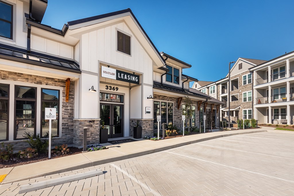 an empty street in front of a building