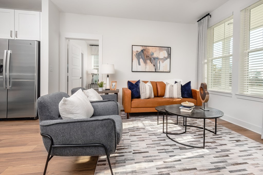 a living room with a couch and a chair