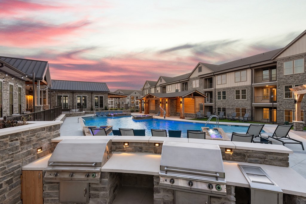 the preserve at ballantyne commons outdoor amenities include a pool and grilling stations