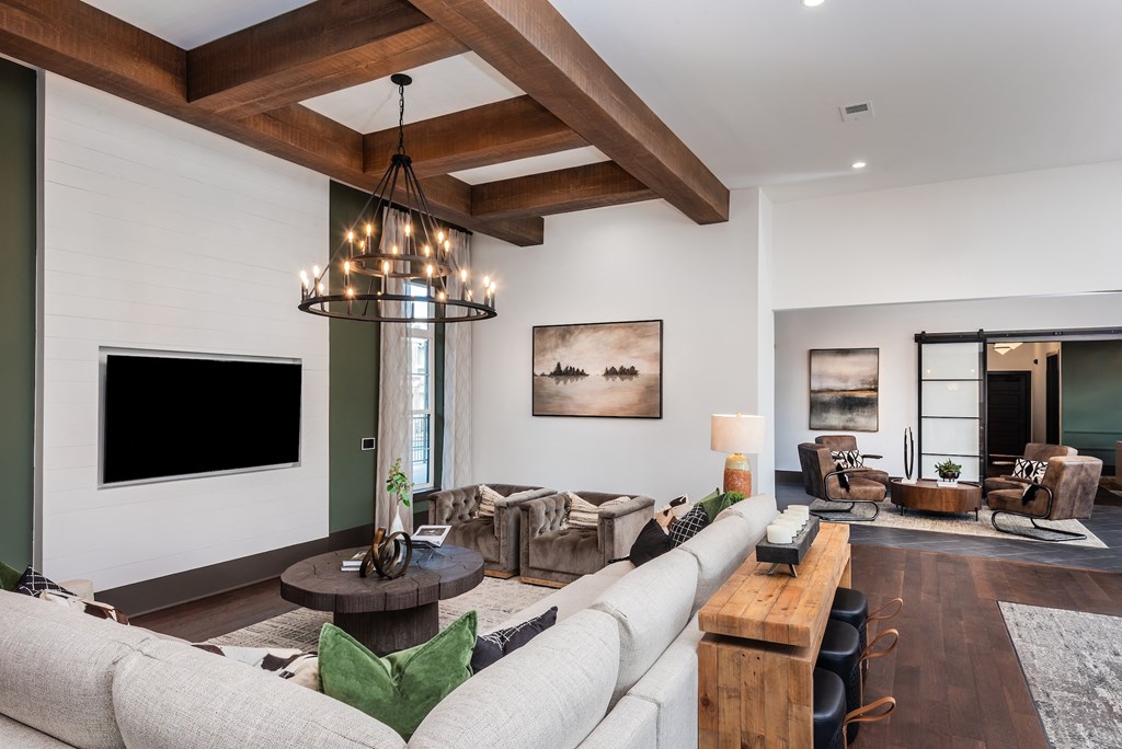 a living room with a couch and a tv