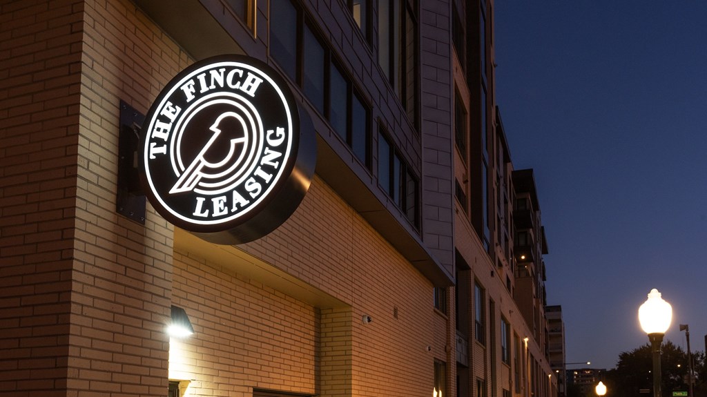 The Finch Lending logo is displayed on a building.