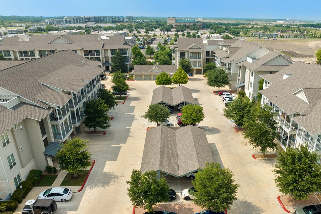 an aerial view of a large neighborhood with several rows of houses