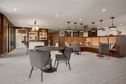 a room filled with furniture and a large window