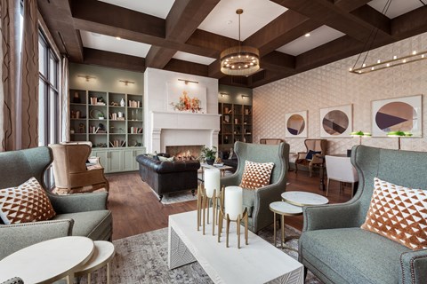 a living room filled with furniture and a fire place