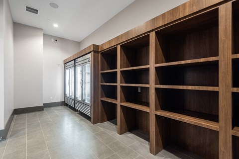 a modern and funky half bathroom reveal with black and white tile in a modern laundry room