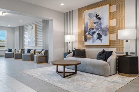 a living room filled with furniture and a large window