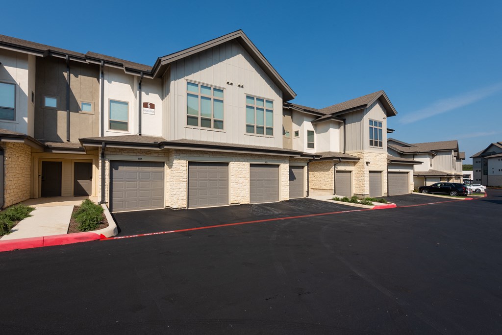a large building with garage doors in front of it