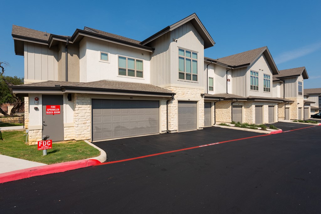 a house with a sold sign in front of it