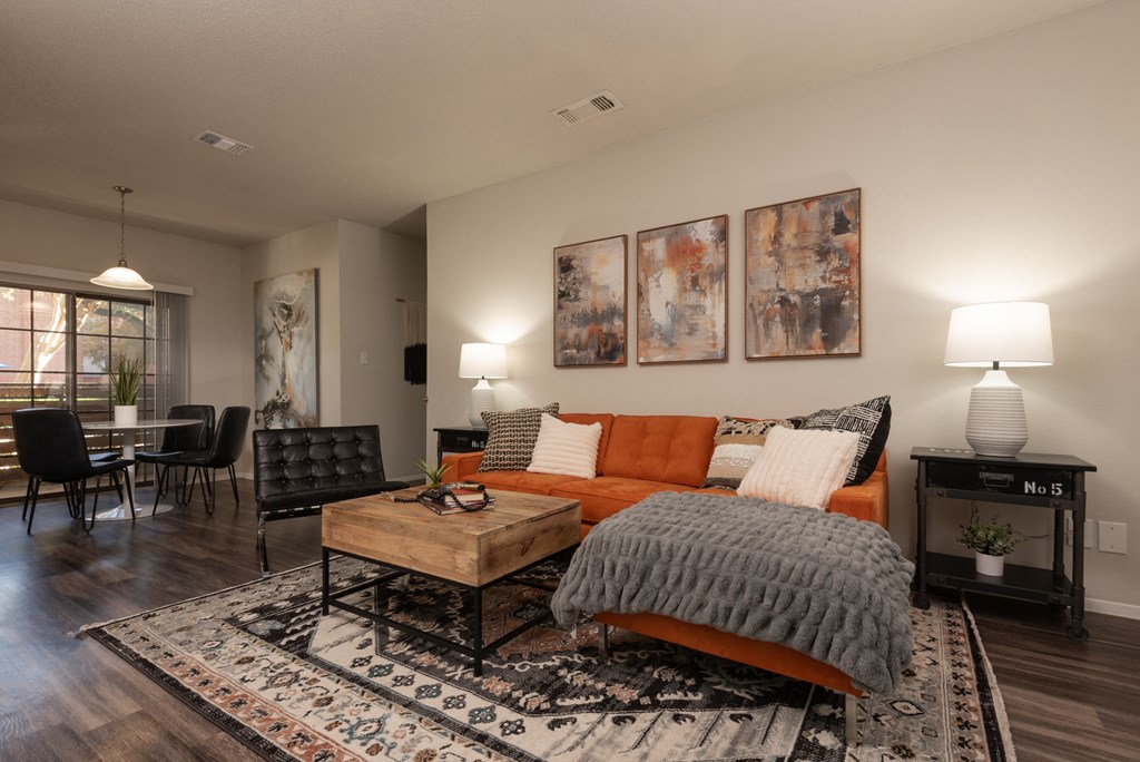 a living room with a couch and a table