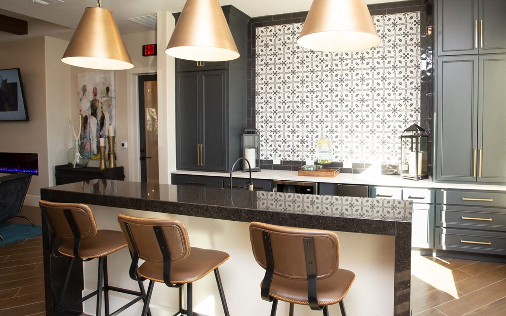 bar area at mela's apartments in san antonio