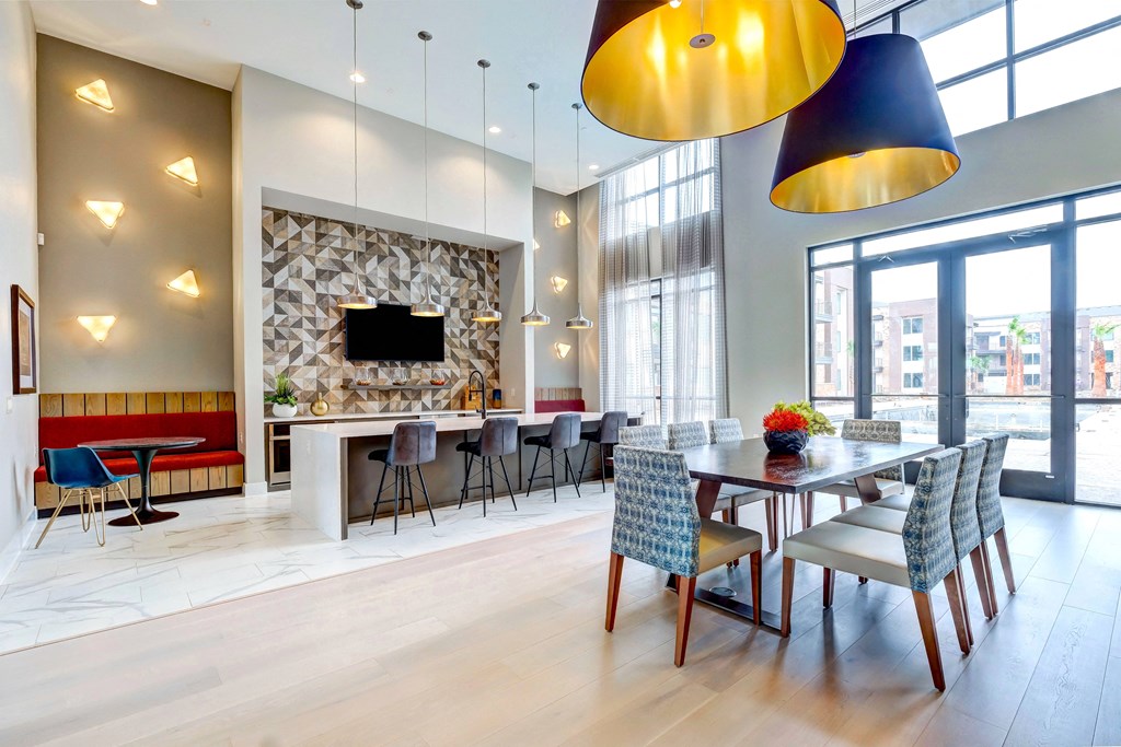 a dining room with a table and chairs and a fireplace
