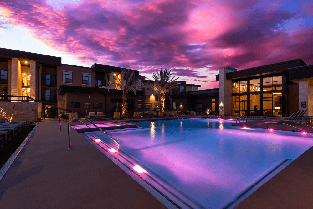 pool area at night of escape at arrowhead's apartments in glendale az