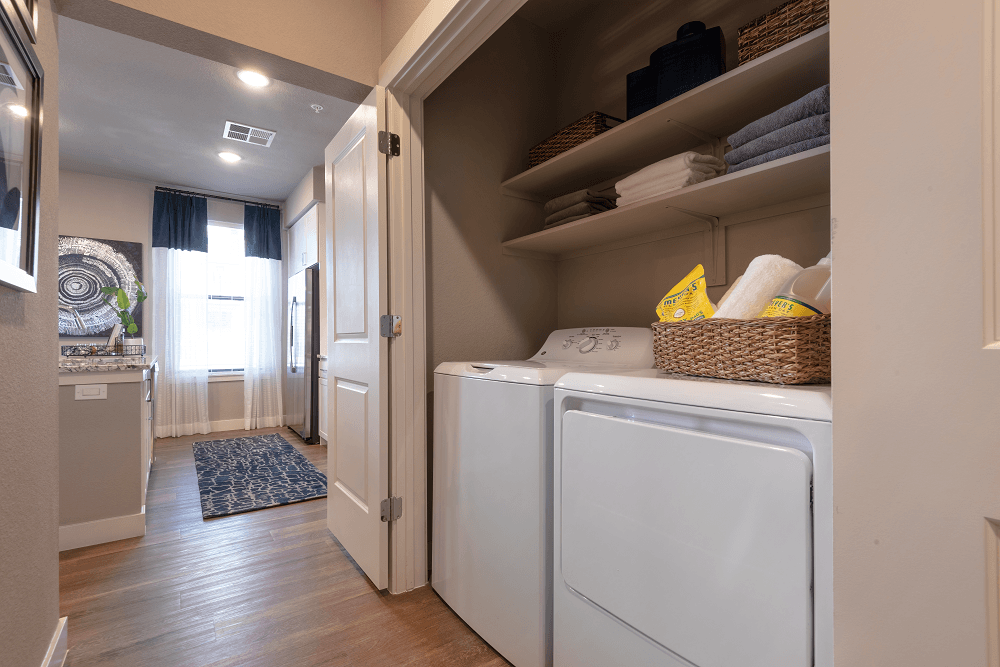 laundry room at escape at arrowhead apartments