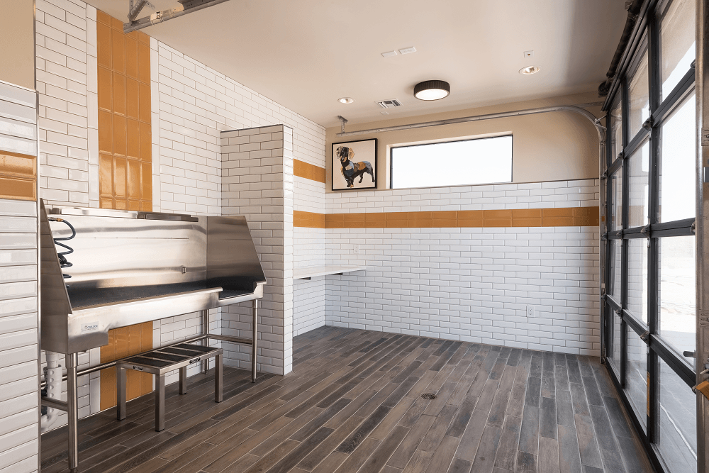 a kitchen with a stove and a window