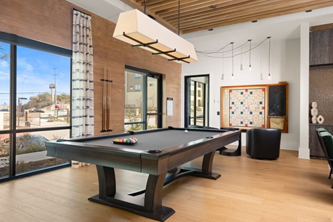 pool table in the game room at ironridge at hill country village apartments