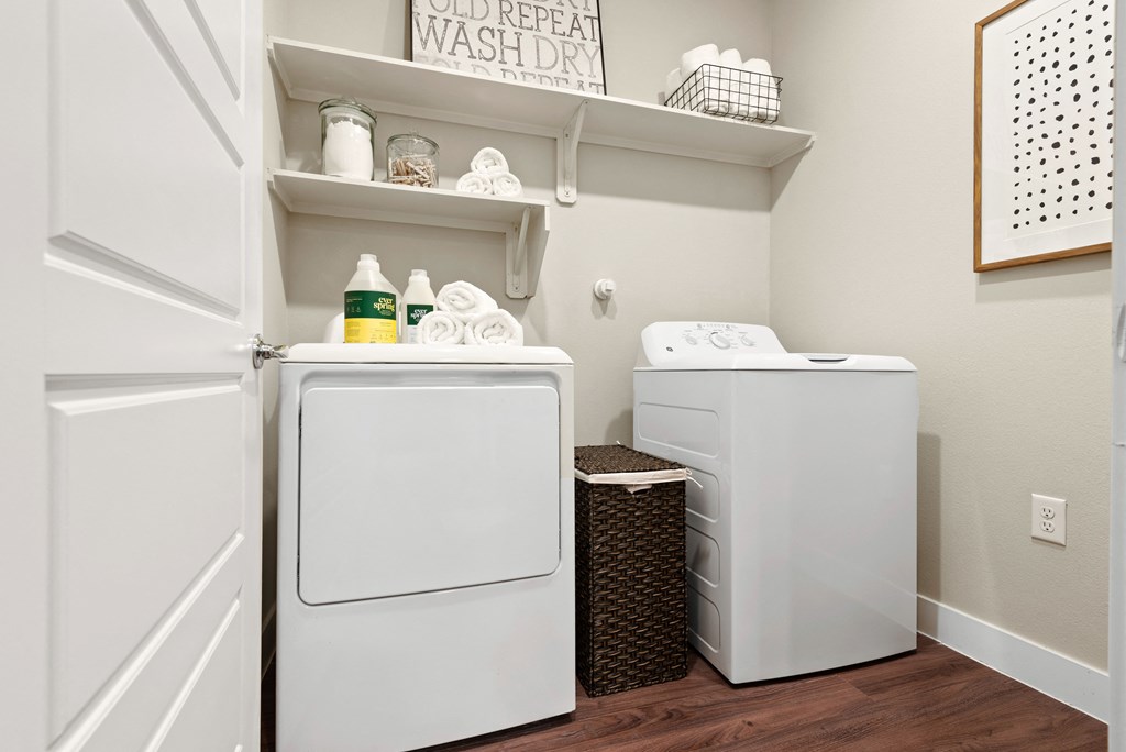 in-unit washer and dryer of an apartment at ironridge at hill country village